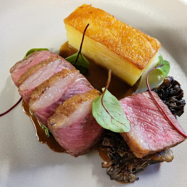 Lamb Loin with Maitake Mushrooms & Truffle-Infused Pommes Dauphinoise